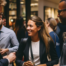 Legal professionals networking and building business relationships at an end-of-year corporate event.